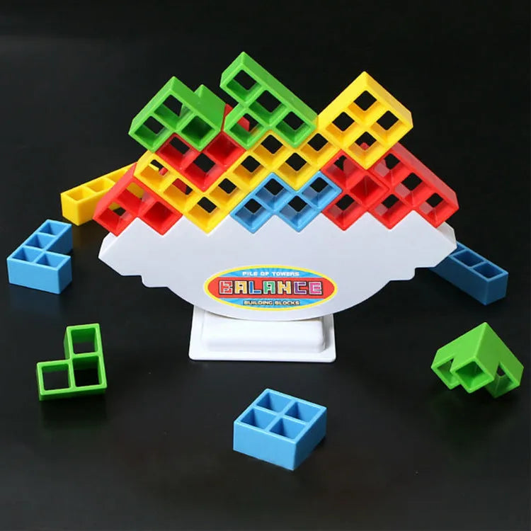 Plastic balance stacking board game with 16 colourful blocks on a chassis and base