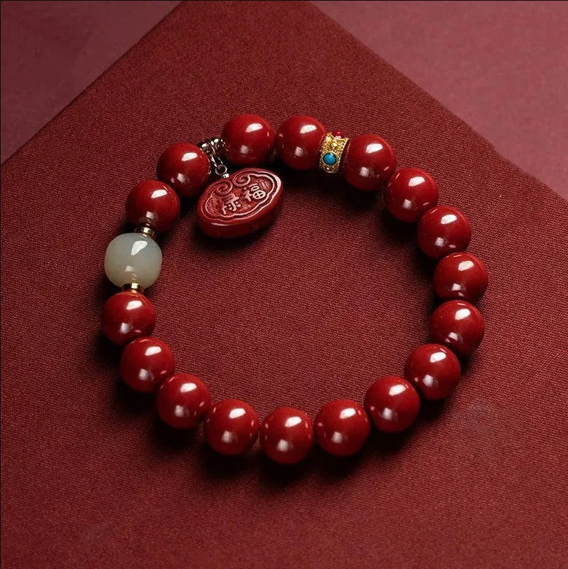 Natural cinnabar emperor sandstone bracelet with adjustable closure in 8mm or 10mm sizes