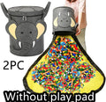 Green felt cube storage bag transformed into flat play mat with pull rope