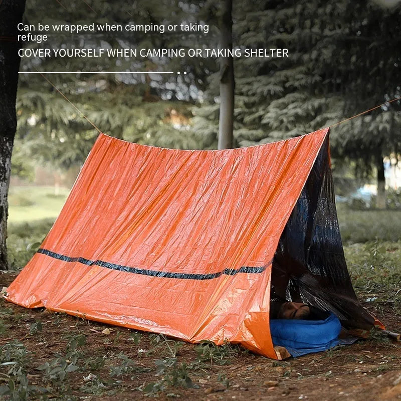 Orange portable disaster relief tent kit with sleeping bag and safety whistle for emergency shelter