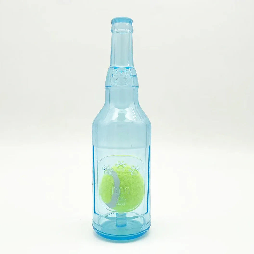 Blue water bottle dog chew toy with squeaker floating in pool for interactive play.