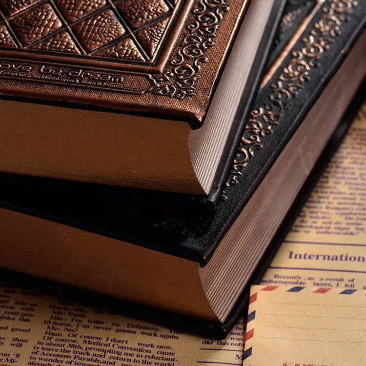 Embossed faux leather notepad with textured cover in bronze colour showing 120 thick sheets