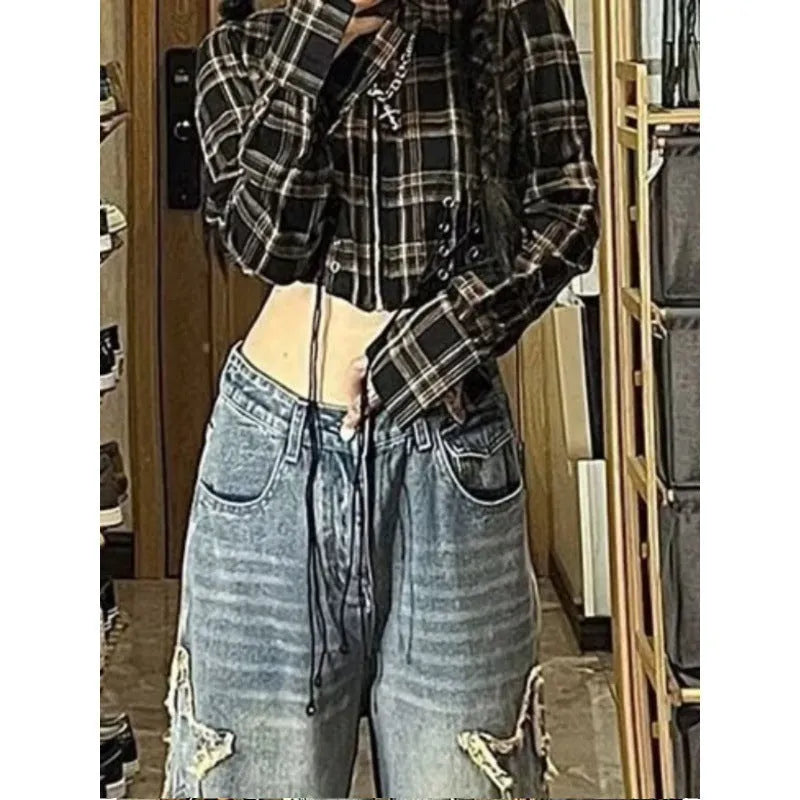 Blue high-waisted wide-leg denim jeans with straight cut on woman