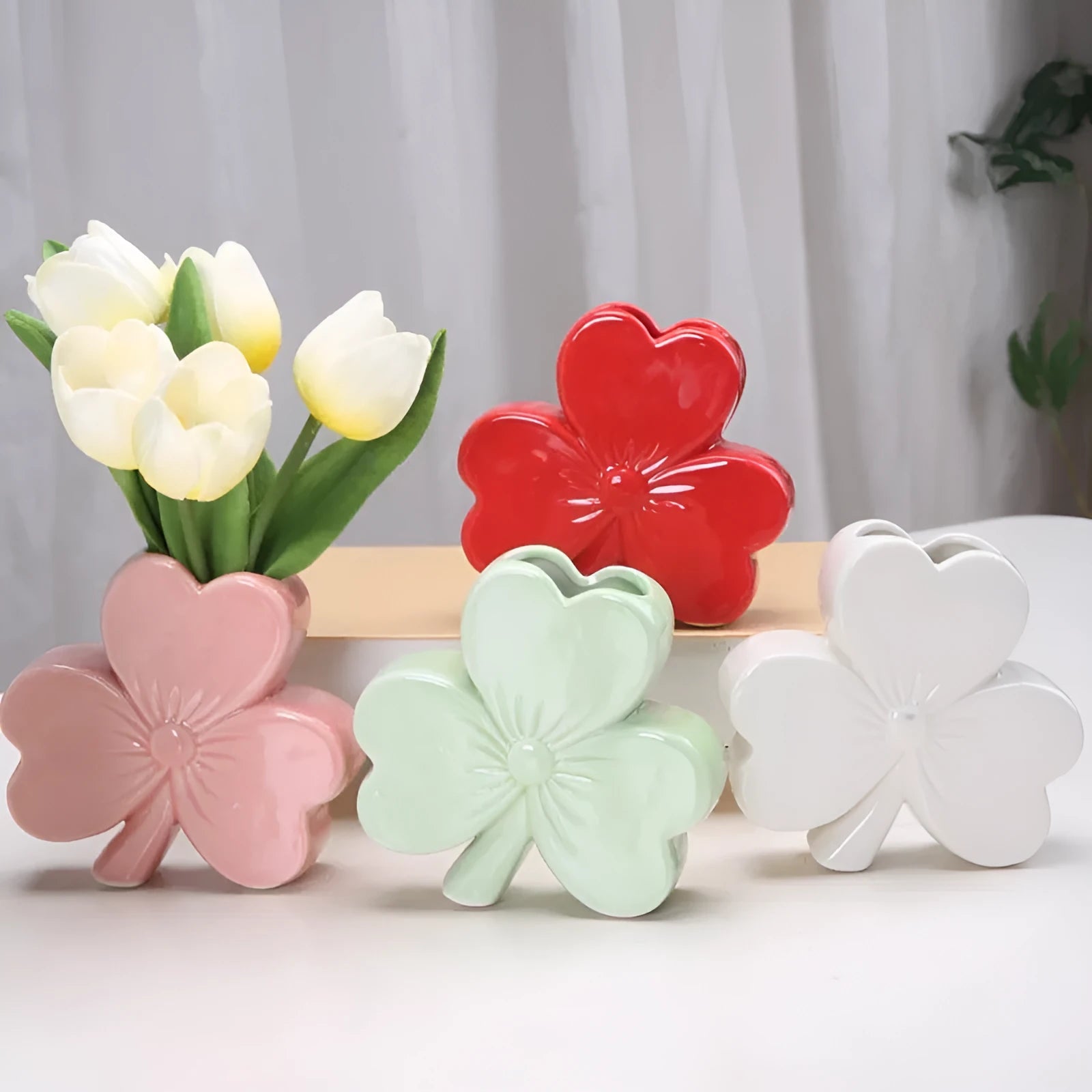 White porcelain ceramic desktop vase with European styling in light green colour
