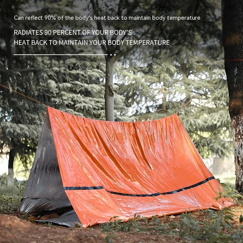 Orange portable disaster relief tent kit with sleeping bag and safety whistle for emergency shelter