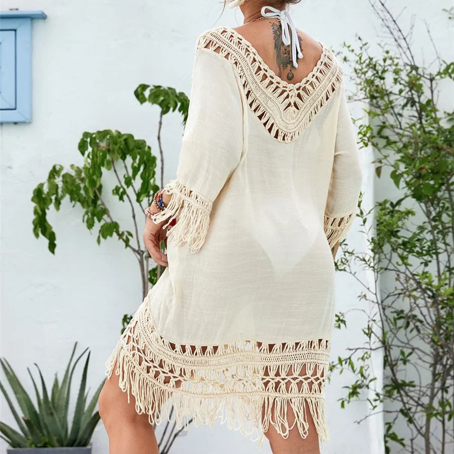 Apricot crocheted patchwork women's dress with half sleeves and a mid-length skirt.