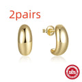 Sterling silver C-shaped stud earrings in electroplated gold or white gold finish