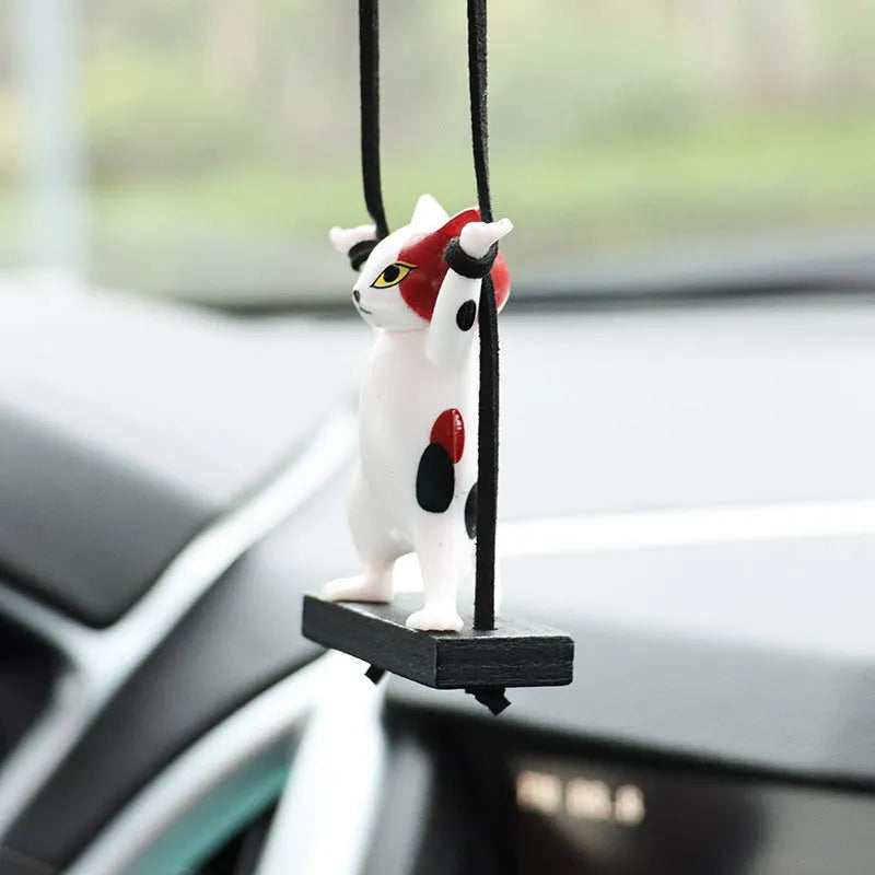 Cartoon-style resin cat pendant for car interior with adjustable rope