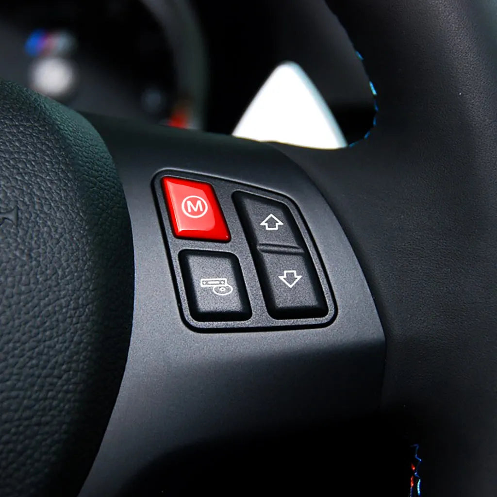 Red and blue BMW steering wheel M1 M2 mode replacement button set with installation keys.