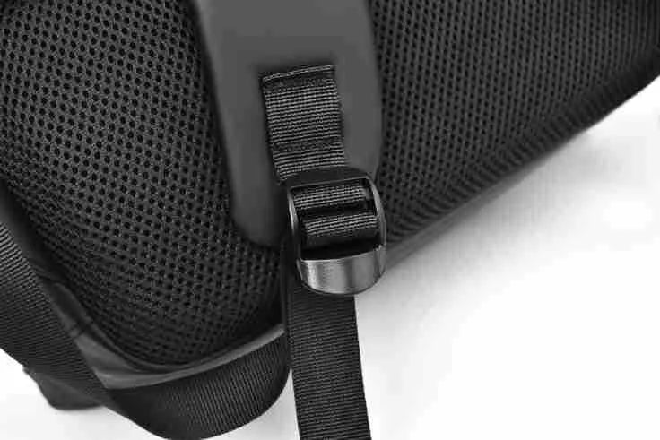 Large black waterproof PU leather backpack with sewing thread detail, shown from a side angle.