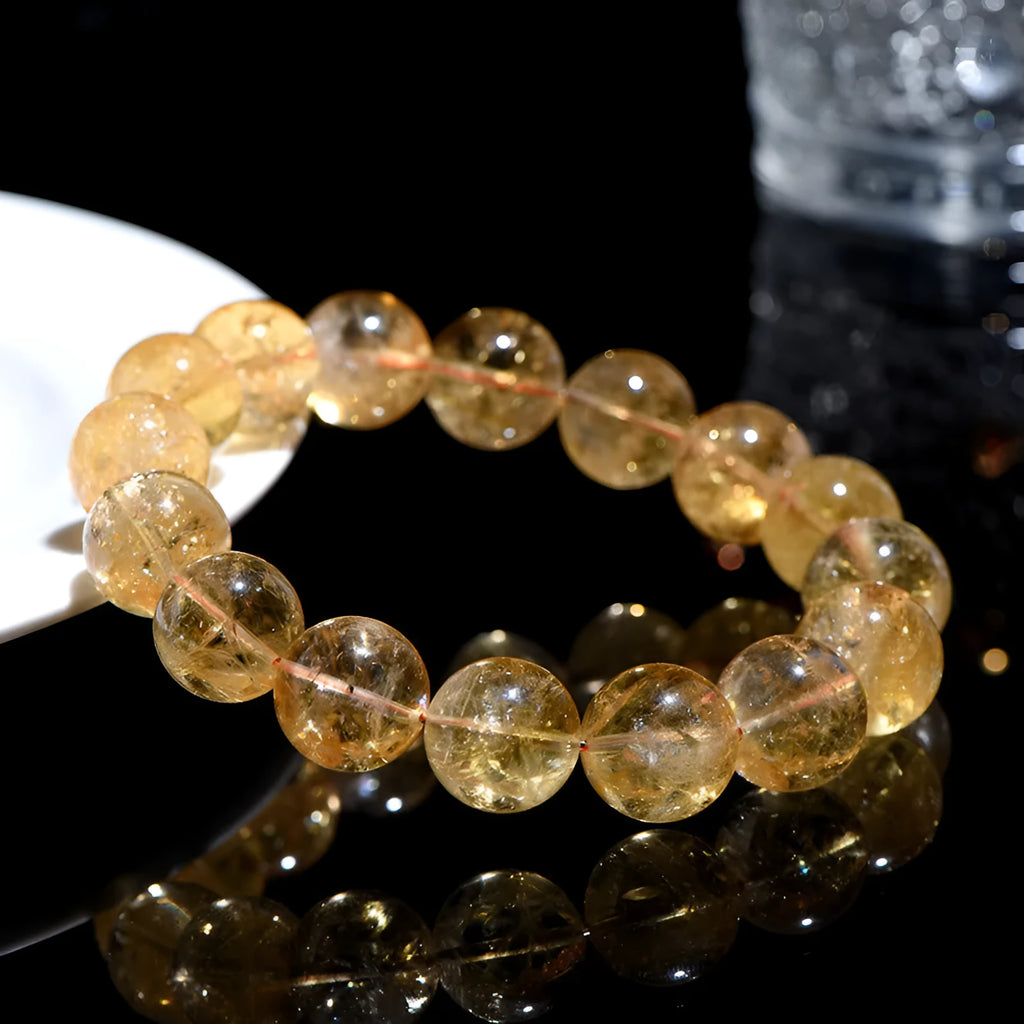 Natural yellow citrine bracelet with geometry-shaped beads in multiple size options on adjustable closure