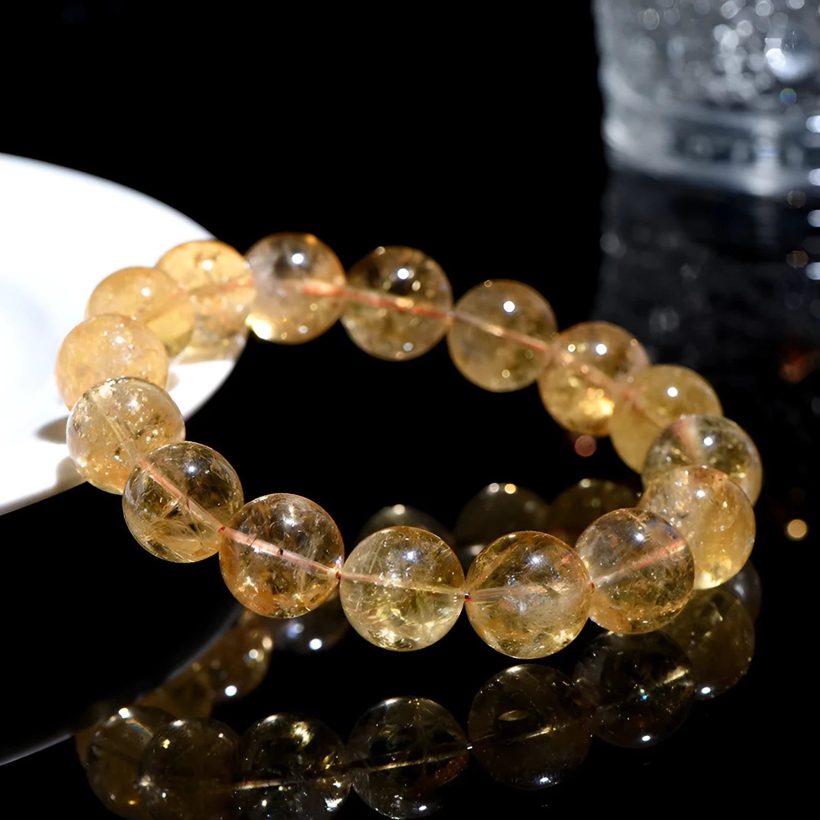 Natural yellow citrine bracelet with geometry-shaped beads in multiple size options on adjustable closure
