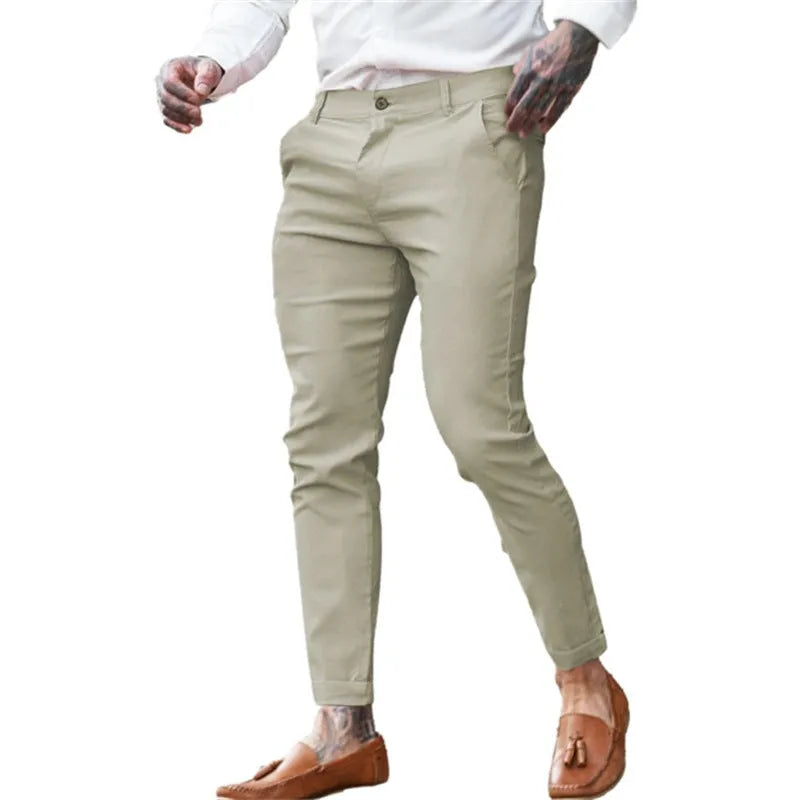 Men's slim-fit cotton stretch pencil pants in twill fabric showing high elasticity and pencil silhouette