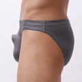 Men's transparent nylon boxer shorts laid flat in blue, black, white, grey, and sky blue colours.