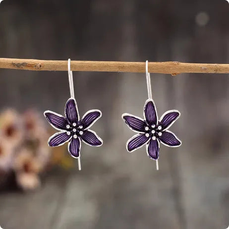 Purple flower-shaped alloy earrings with electroplated finish and butterfly clasps