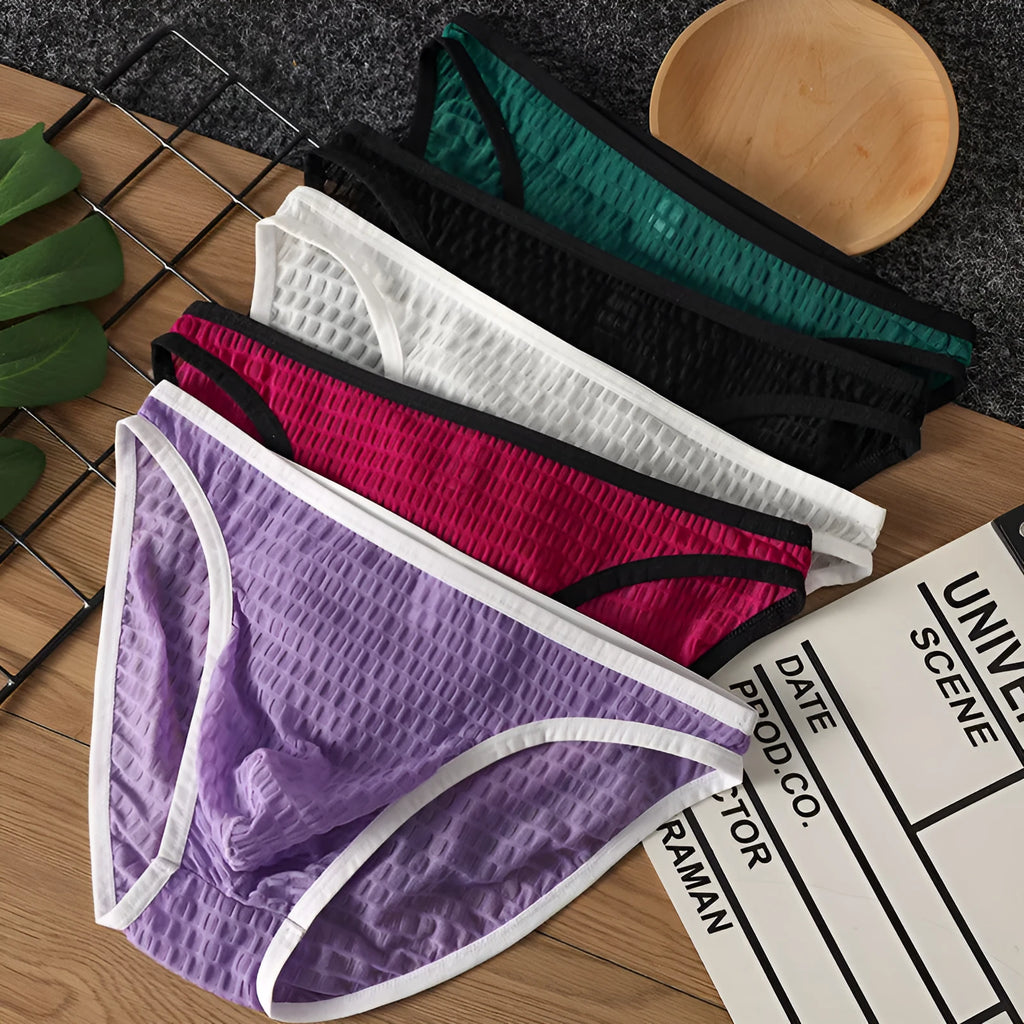 Men's low waist nylon lace underwear in light purple colour showing transparent visual design