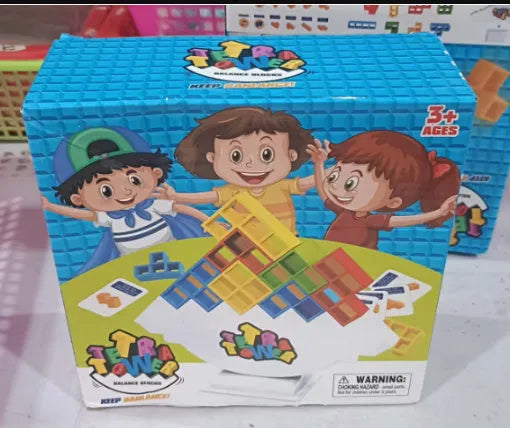 Plastic balance stacking board game with 16 colourful blocks on a chassis and base