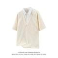 Men's apricot and black heavy Henry collar short sleeve polo sweater made from thin spandex fabric.