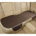 Linen car cushion with hemmed edges in plaid pattern for business vehicle seating