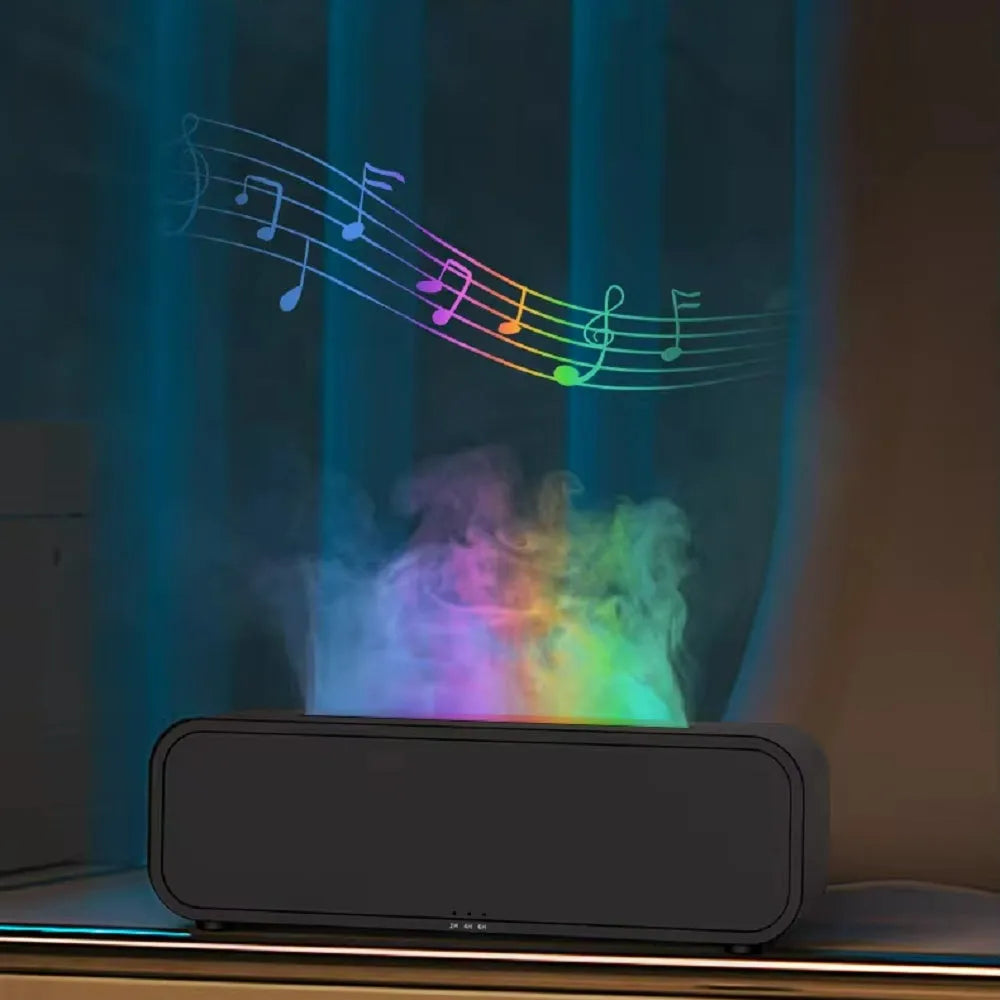 Black Flame Dynamic essential oil aroma diffuser with remote control on a wooden table, showing colour-changing LED lights.