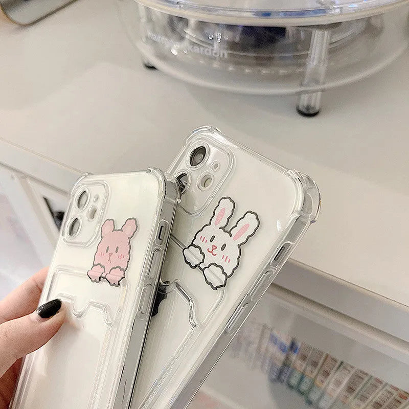 Clear cartoon printed iPhone case with card holder slot on the back.
