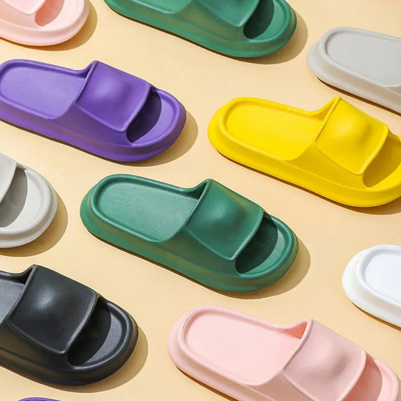 Soft EVA flip-flop slippers with thick non-slip soles in multiple colours on a white background.
