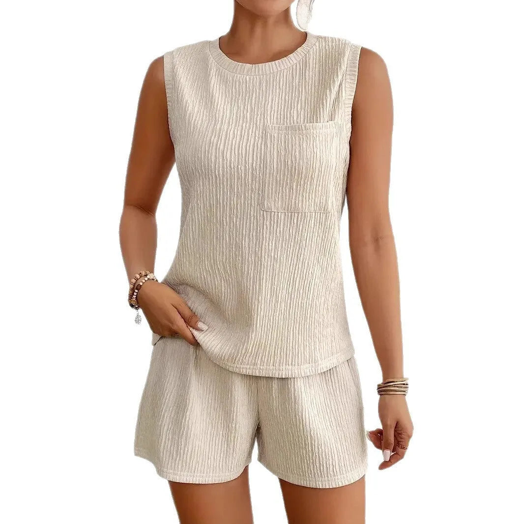 Women's sleeveless vest and matching shorts set in solid apricot colour