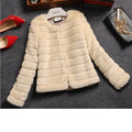 Women's short white faux fur top with regular sleeves and rabbit fur style texture