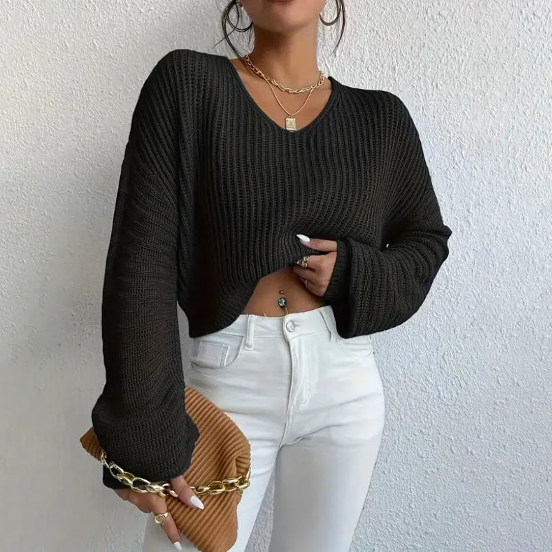 Women's long sleeve pullover in solid colour with loose casual fit and threads decorative element