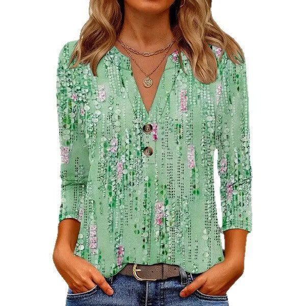Women's loose fit V-neck top featuring a 3D printed pattern, shown in a colour option.