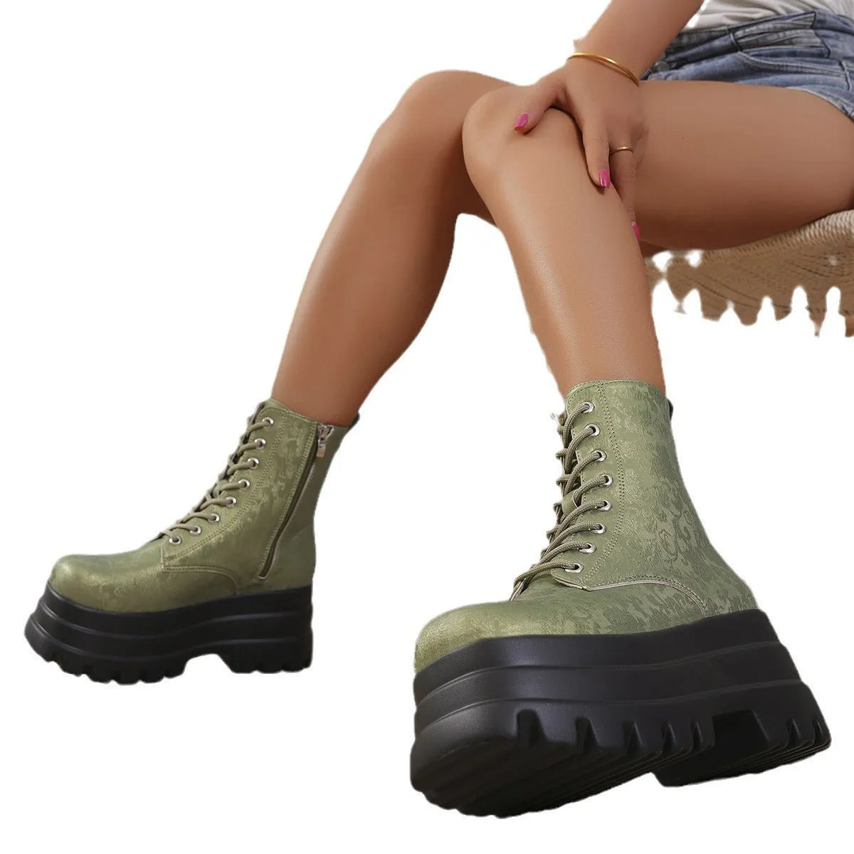 Women's white retro platform Martin boots with a chunky heel and side zipper on a neutral background.
