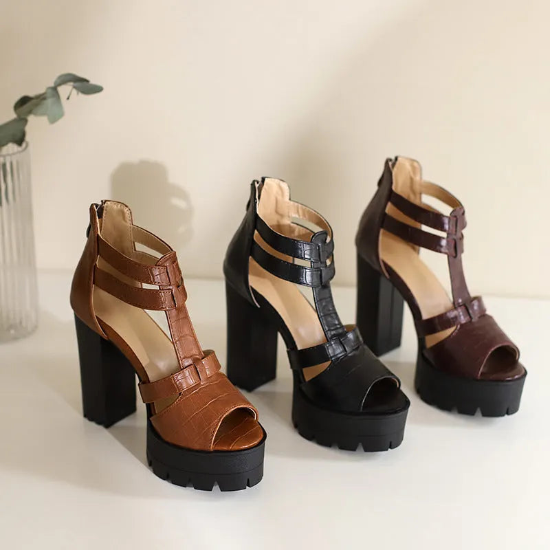 Women's black platform high heel sandals with a back zip, round toe, and a rubber sole.