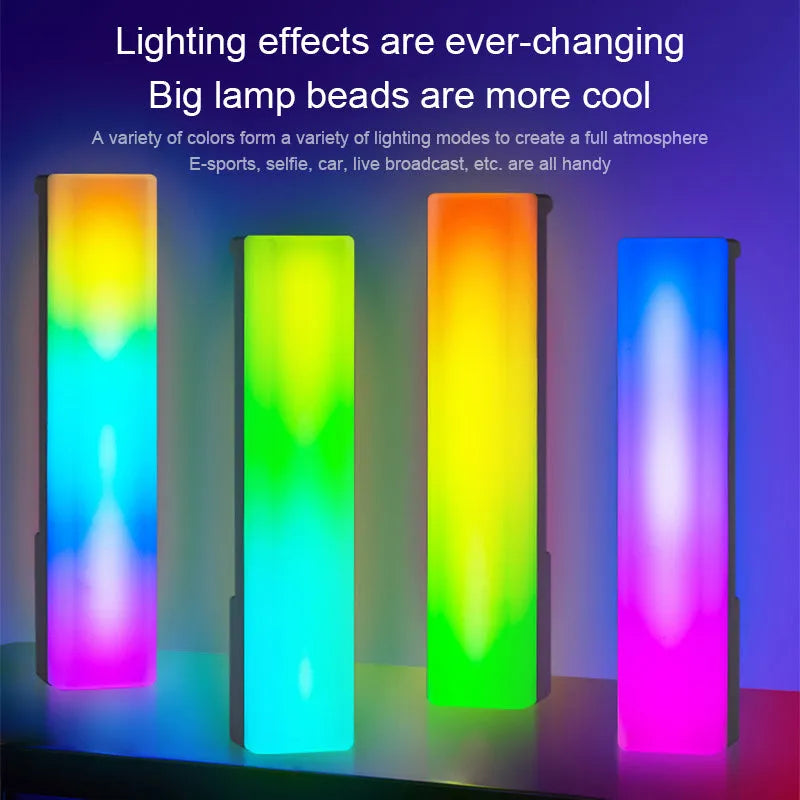 3D RGB voice-activated table top ambiance lamp in white or black shell with USB cable.