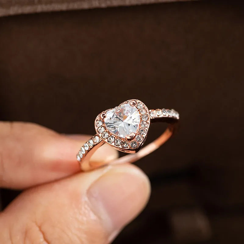 Heart-shaped crystal women's wedding ring with electroplated rose gold finish on white copper band