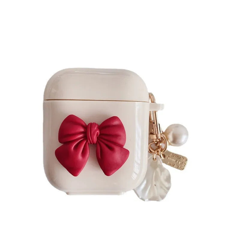 Beige red bow shell TPU AirPods case cover with clamshell design for AirPods 3, Pro 3, and 1/2 models