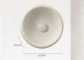 Japanese modern simple wall lamp with white resin shade in three size options on a plain wall.