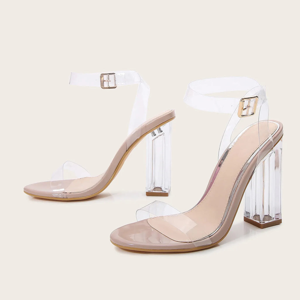 Apricot colour women's high-heel sandals with a glass-effect heel and round toe, showing the buckle fastening.