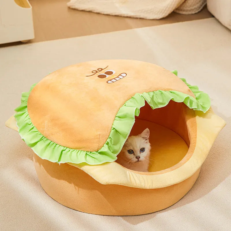 Green medium-sized outdoor cat kennel with a removable cover and raised plastic base.