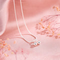 Silver cherry necklace for women with fruit pendant on a snake bone chain, adjustable length.