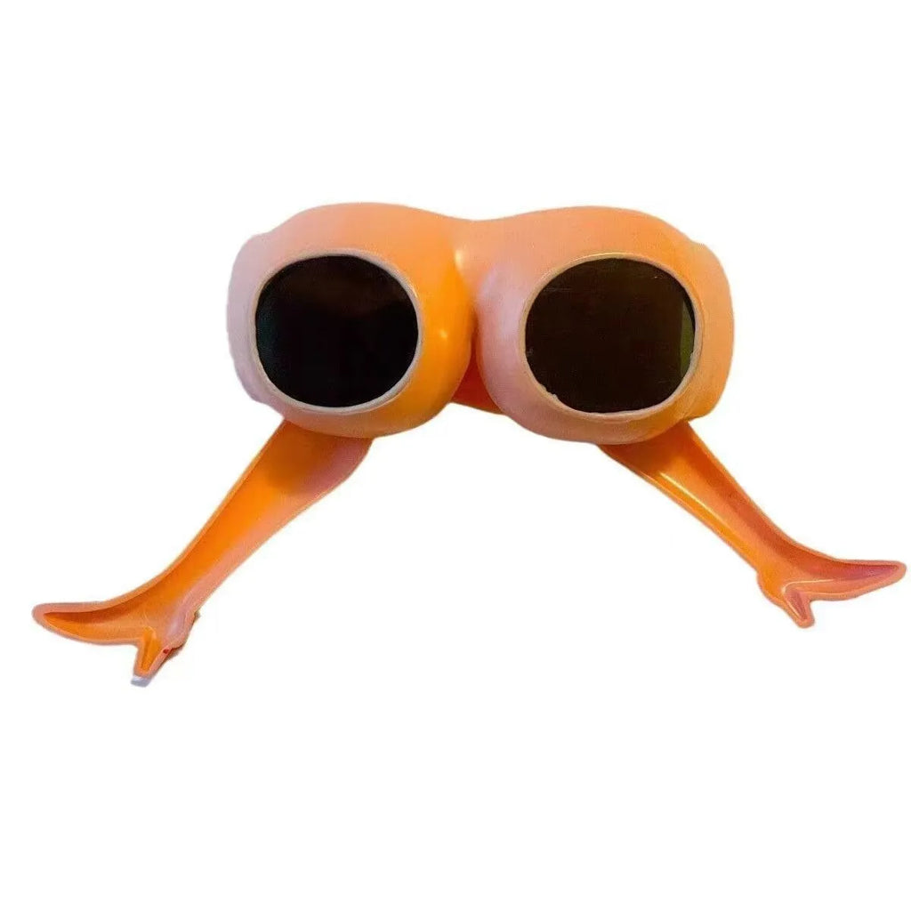 Orange plastic novelty sunglasses with oversized personality leg and hip design on the frame.