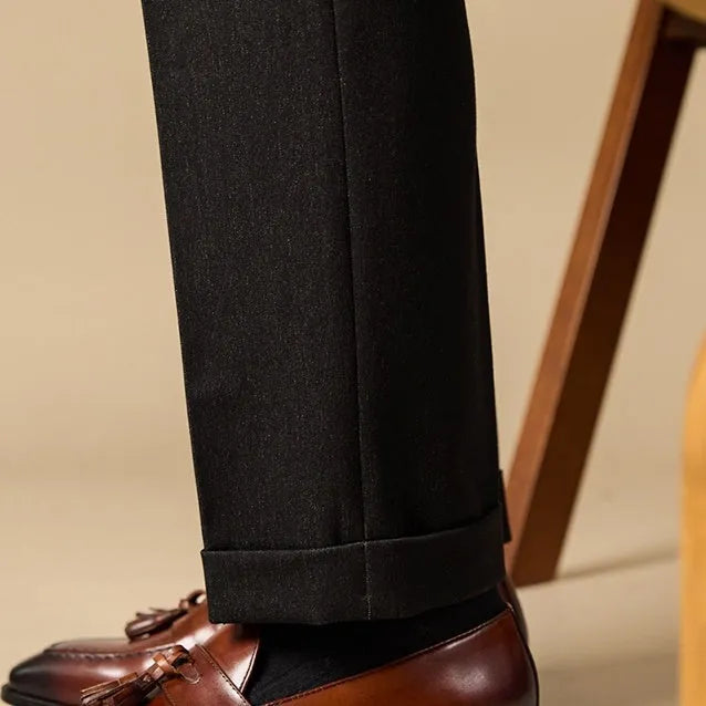 Men's black tassel loafers with genuine leather upper and British style detailing