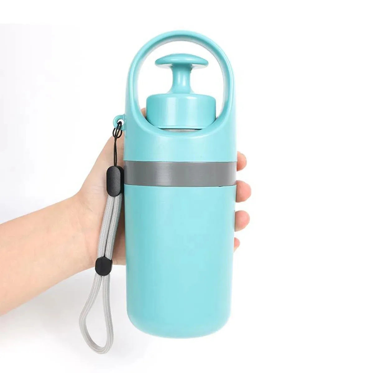 Blue and orange plastic claw-style pet pooper scooper with a roll of waste bags.