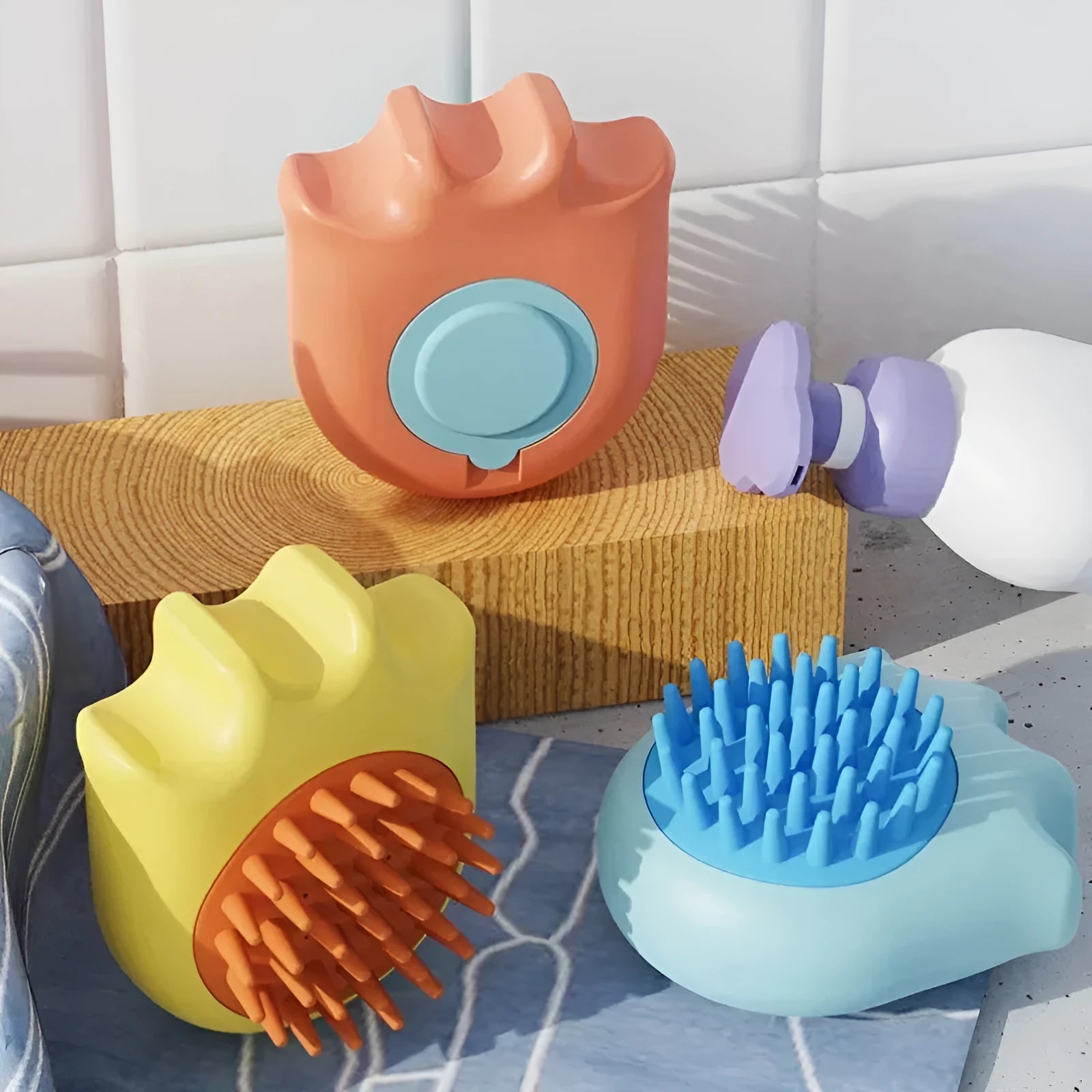 Blue pet bath brush with shampoo box showing massage brush and comb heads