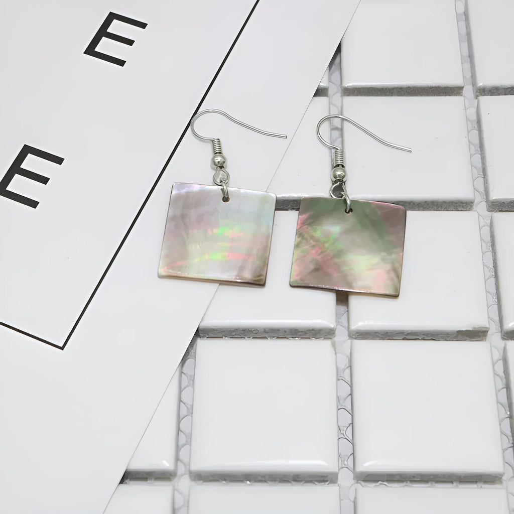 Women's geometric shell earrings in rectangular and square panther natural colours