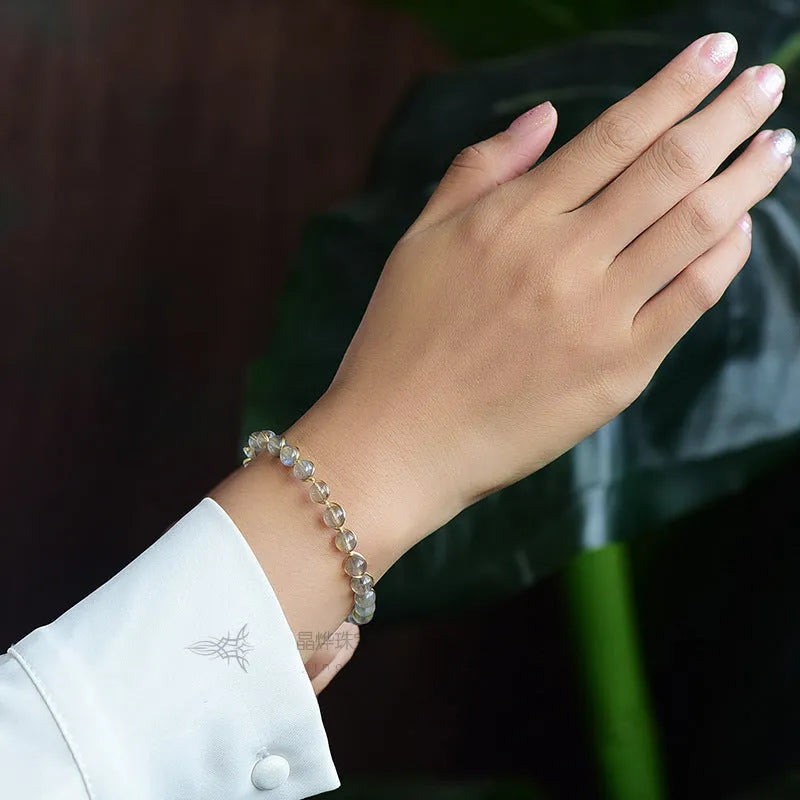 14K gilded women's bracelet with 6mm blue moonstone centrepiece and starry sky metal detailing