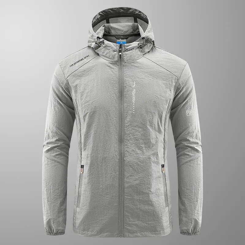 Men's thin nylon hooded summer top in light grey on a hanger