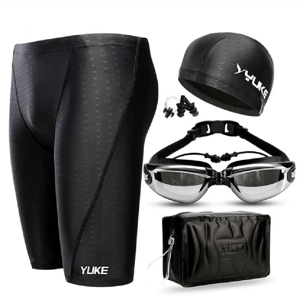 Men's black swimming set with trunks, anti-fog goggles, waterproof cap, ear plugs with nose clip, and storage bag