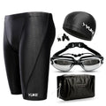 Men's black swimming set with trunks, anti-fog goggles, waterproof cap, ear plugs with nose clip, and storage bag
