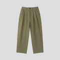 Men's loose lightweight cotton linen trousers in apricot colour showing wide-leg Korean style design
