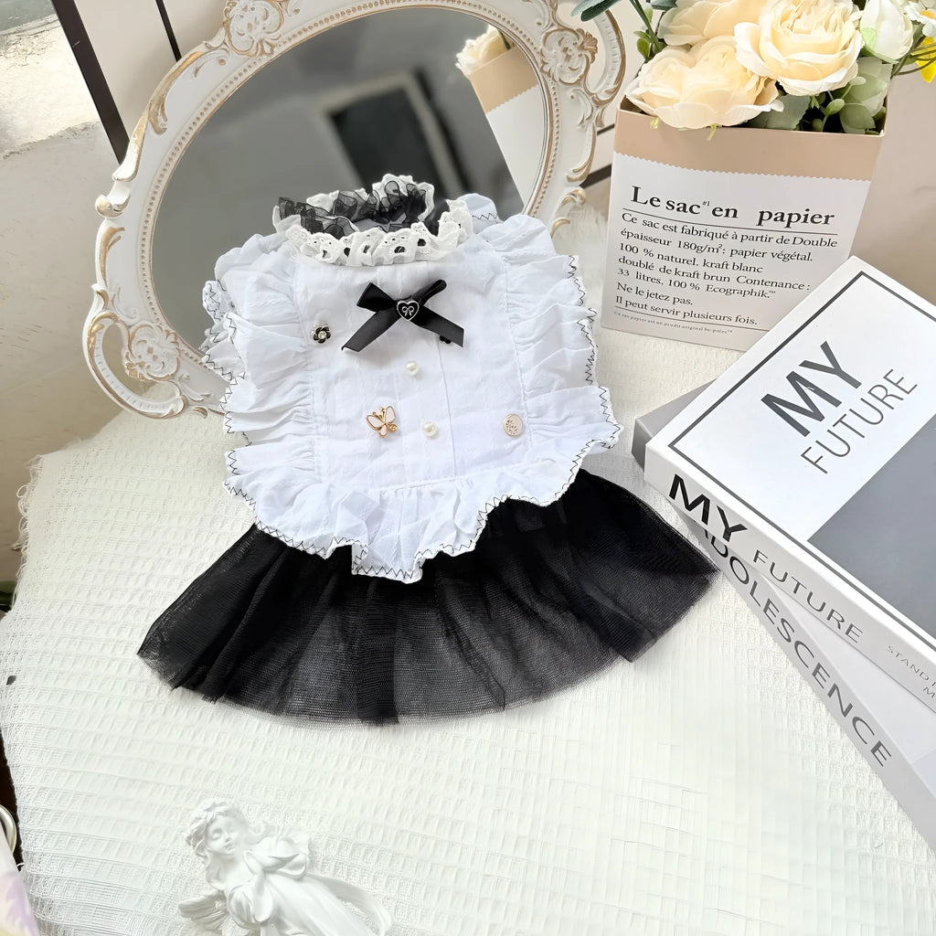 White yarn princess-style gauze skirt for small to medium dogs on mannequin showing chest and length measurements